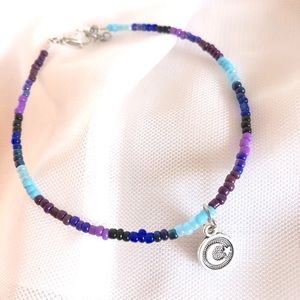 Hand beaded charm bracelet